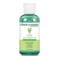 Green bottle of clean+easy prep pre-epilation oil on a white background