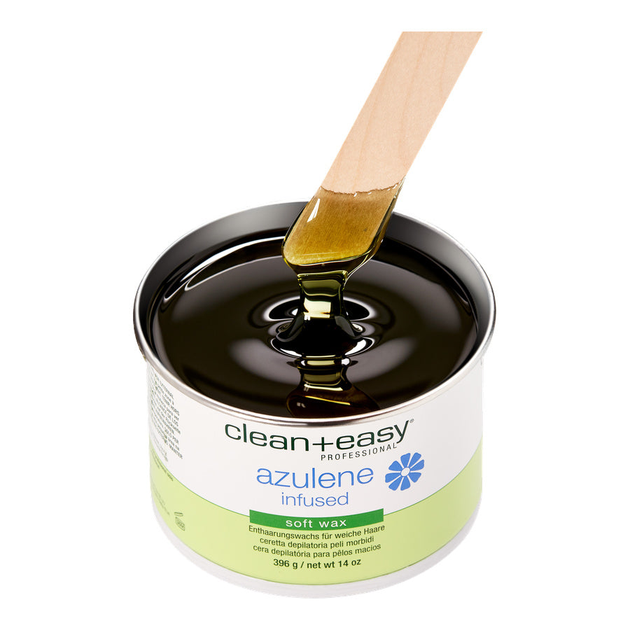 Can of clean+easy azulene infused soft wax with a wooden applicator on a white background