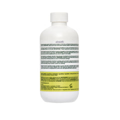 Back side of white bottle of Lavendar Pre-Wax Treatment on a white background