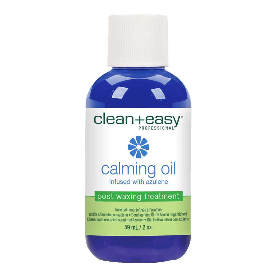 Bottle of clean+easy calming oil on a white background